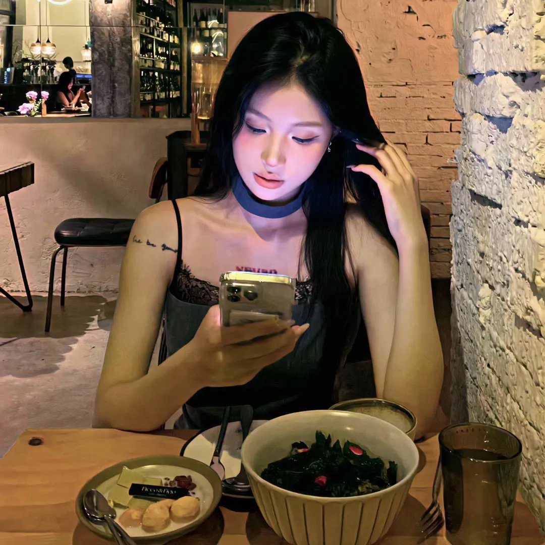 彼女